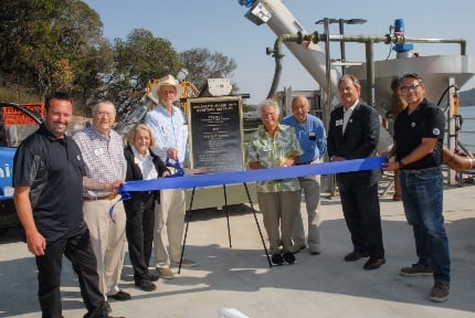Ribbon-cutting ceremony at the new treatment plant grounds.
